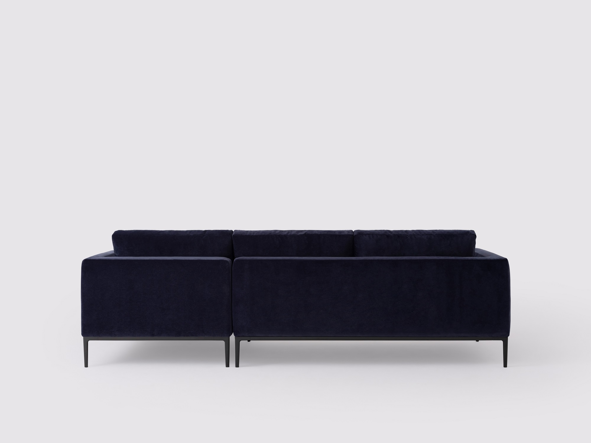 Back view of the Oma modern sectional couch in blue velvet 